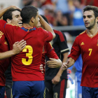 Los jugadores de la selección olímpica Javi Martínez, Domínguez  y Adrián celebran el gol.