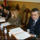 Carrasco observa a Villanueva y Rodríguez durante la firma del acuerdo