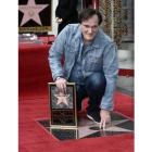 Quentin Tarantino posa junto a su estrella.