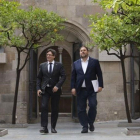 El 'president' de la Generalitat, Carles Puigdemont, y el 'vicepresident', Oriol Junqueras.