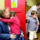 Una niña llora abrazada a su madre antes de entrar en el aula en su primer día de colegio en Navarra