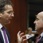 Dijsselbloem, presidente del Eurogrupo y De Guindos, candidato a la próxima elección.