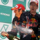 Webber y Vettel celebran su victoria, un doblete histórico para Red Bull