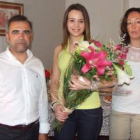 Palazuelo y Quesada flanquean a la joven.