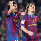 Bojan y Messi celebran el triunfo del Barça ante el Deportivo en el Camp Nou.