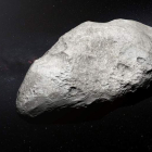 Ilustración que muestra al asteroide exiliado 2004 EW95, el primero encontrado rico en carbono. EFE/ESO/M. KORNMESSE RMA