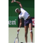 Venus Williams realiza ejercicios de calentamiento en un entrenamiento