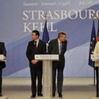 Sarkozy, el primer ministro danés, Anders Fogh Rasmussen, el actual secretario, Jaap de Hoop, y Merk