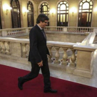 El 'president' Carles Puigdemont, en el Parlament para asistir a una sesion de control al Govern.