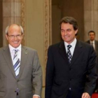 El presidente de la Generalitat y el de CiU, momentos antes del encuentro de ayer.
