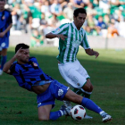 Juande, con el Real Betis, jugando frente al Girona FC.