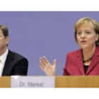 La canciller alemana, Angela Merkel y su homólogo del Partido Liberal, Guido Westerwelle.