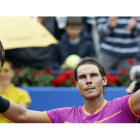 Rafa Nadal celebra su victoria por 6-1 y 6-2 frente al brasileño Rogerio Dutra Silva. ANDREU DALMAU