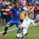 El centrocampista croata Modric fue el mejor de los suyos mientras estuvo en el campo. KOCHETKOV