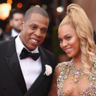 Una foto de archivo de beyoncé y su marido, Jay Z. En la derecha, la diseñadora Rachel Roy.