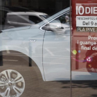 Concesionario de Kia en Barcelona con publicidad de una campaña comercial relacionada con el Pive.