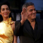 George Clooney y su mujer, Amal Clooney, en la alfombra roja de la 'prémiere' de la película 'Tomorrowland' en Tokio durante el mes de mayo de 2015.
