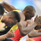 Usain Bolt toma la salida en las series de los 100 metros, su debut en los Juegos de Río.