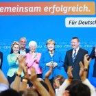 Merkel reacciona a los primeros resultados de las elecciones federales alemanas en la sede de la CDU en Berlín.