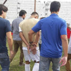 Fotografia cedida por la Policia Civil de Rio Grande Do Sul  del jugador de futbol brasileno Marlon Natanael de Lima Alexandre en el momento en el que es arrestado.