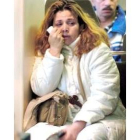 Una mujer muestra su emoción en el trayecto Alcalá de Henares-Atocha