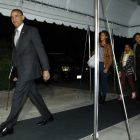 Barack Obama y su familia, a su llegada a Washington camino de la Casa Blanca.