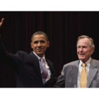 Obama y George  W. Bush, en la universidad A&M de Texas en College Station el pasado viernes.
