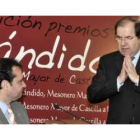 Pedro Arahuetes escucha la intervención de Herrera, a quien el alcalde segoviano reclamó el compromi