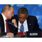 Obama escucha a Putin, antes de la reunión del G-20, el lunes en Los Cabos (México).