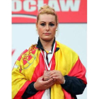 La ponferradina Lidia Valentín muestra la medalla de bronce conseguida en el Campeonato del Mundo de halterofilia que se celebra en Polonia.