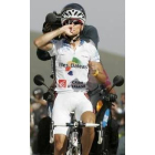 Valverde hace un gesto de triunfo tras vencer en la séptima etapa