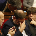 Carles Puigdemont, Oriol Junqueras y Jordi Turull, durante el pleno de la ley de ruptura en el Parlament.