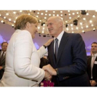 Merkel y Papandreu en el encuentro con empresas alemanas.