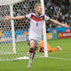 El delantero alemán Schürrle celebra el gol que le hizo a Argelia en la prórroga.
