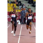 Gatlin y el nigeriano Olusoji Fasuba durante la carrera del viernes