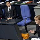 La canciller alemana, Angela Merkel, interviene ante el Parlamento federal, hoy.
