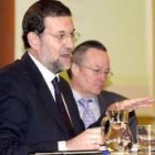Rajoy y Piqué en la rueda de prensa tras el Consejo de Ministros