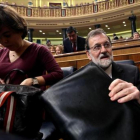Rajoy y Sáenz de Santamaría, en el Congreso, ayer.