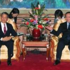 Machimura y el ministro de Administración china Xie Zhenhua