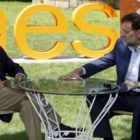 Rajoy, acompañado del ex presidente del Gobierno y presidente de Honor del PP, José María Aznar.