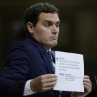 El presidente de Ciudadanos, Albert Rivera, durante su intervención en la segunda jornada del debate de la investidura del candidato del PP, Mariano Rajoy, que se celebra en el Congreso de los Diputados.