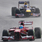 Alonso y Vettel durante los entrenamientos de Sepang.