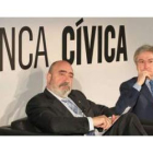 El presidente de Caja Burgos, José M. Arribas y el director general de Caja Navarra, Enrique Goñi, a