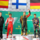 El podio del Gran Premio de Melbourne con Kimi Raikkonen, Fernando Alonso y Sebastian Vettel ocupando el primero, segundo y tercer puesto del cajón.