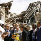 Barack Obama y Silvio Berlusconi a su llegada a la cumbre.