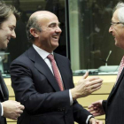 Francois Baroin, De Guindos y Jean-Claude Juncker, en la reunión de ayer en Bruselas.