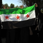 Mujeres de la comunidad siria en Yemen participan en una manifestación de apoyo a las revueltas en su país.