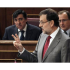 El presidente del Gobierno, Mariano Rajoy , durante su intervención en la sesión de control al Gobierno celebrada hoy.