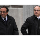 Jordi Turull (a la derecha), con Josep Rull, el pasado marzo, cuando fueron a declarar al Tribunal Supremo. /