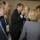 Alierta (Telefónica), Sánchez Galán (Iberdrola) y Brufau (Repsol), con Zapatero en Seúl.